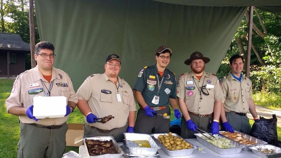 Camp Schoellkopf Staff Serving food during the 100th Anniversary of Camp Scouthaven